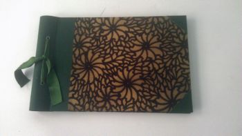 Álbum de fotos artesanal, Encuadernación Milagros Cólera